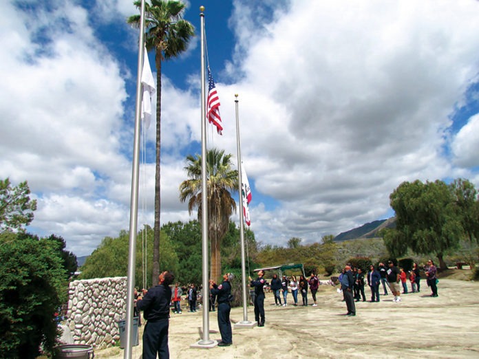 Members of Soboba Fire Dpt raise flag at ceremony Members of Soboba Fire Dpt raise flag at ceremony