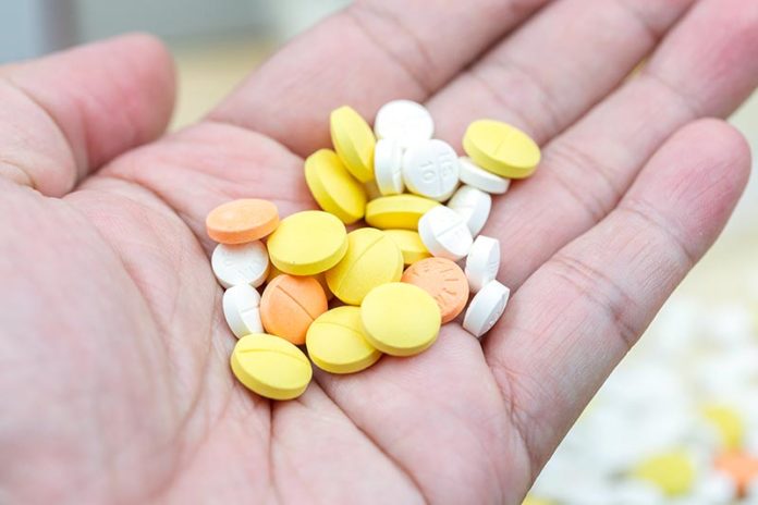 Colorful pills and drugs in close up. Assorted pills and drugs i