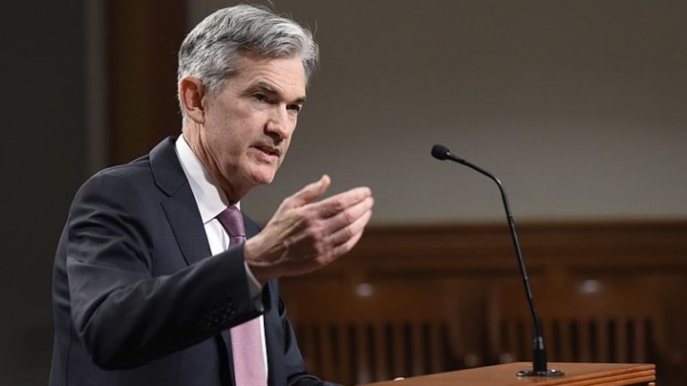 Powell says COVID variant clouds inflation, economic outlook