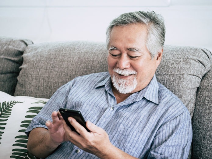 senior_man_using_smart_phone_2021_08_31_06_49_22_utc__3