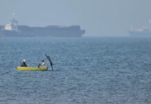 US fires on and disables 2 more Iranian tankers as tensions rise in the Strait of Hormuz