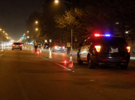 5 DUI arrests at San Jacinto State Street checkpoint Nighttime DUI checkpoint with traffic cones and a patrol vehicle