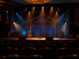 Illustration of an empty country-music stage with guitar and microphone, no people